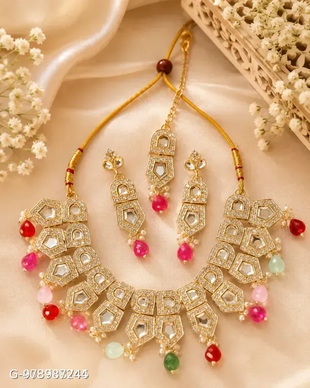 This Karatcart gold-plated Polki Kundan choker set features geometric stone settings accented with multi-colored enamel beads.